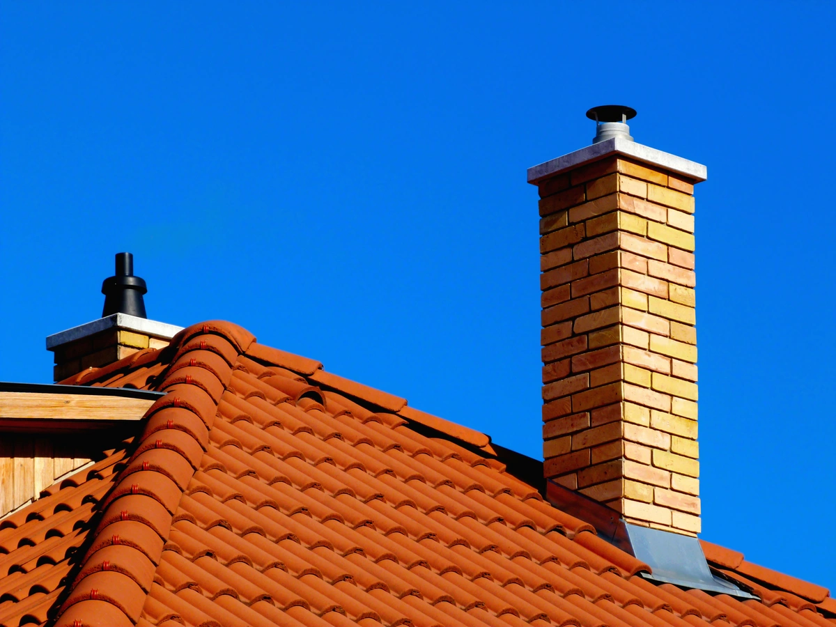 tile roof and brick chimney flashing