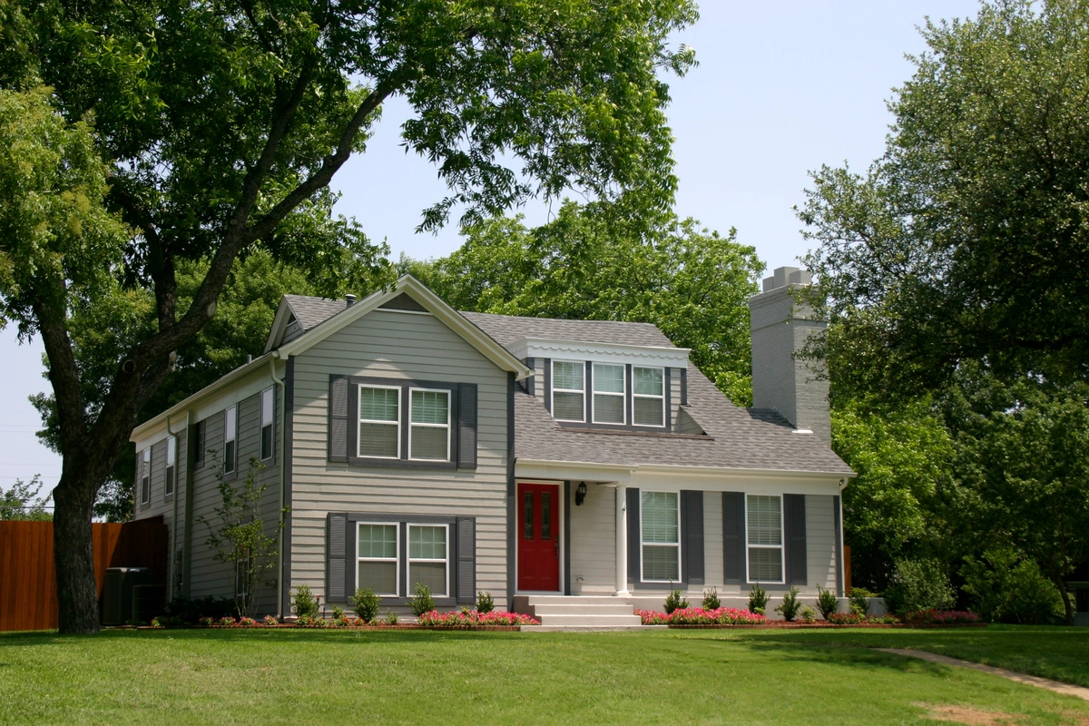 gray house with a red door
