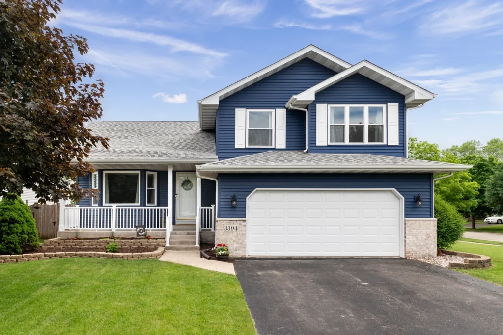 house with dark blue James Hardie siding