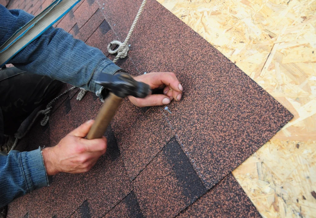 hammering in shingles