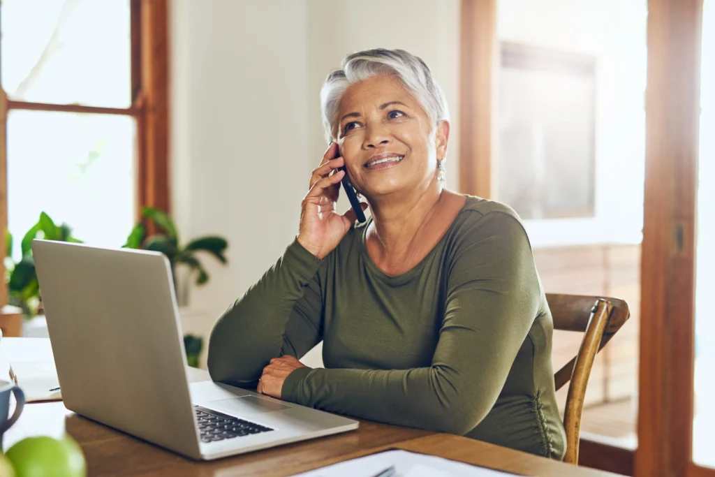 woman on phone calling siding installation company in dublin