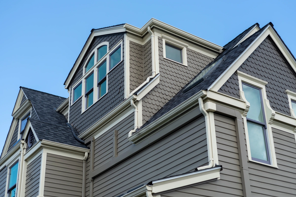 gray siding on a multi-level home