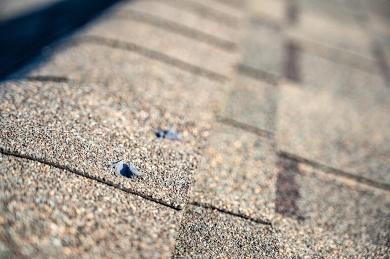 where to nail shingles-close up image of nails in shingles