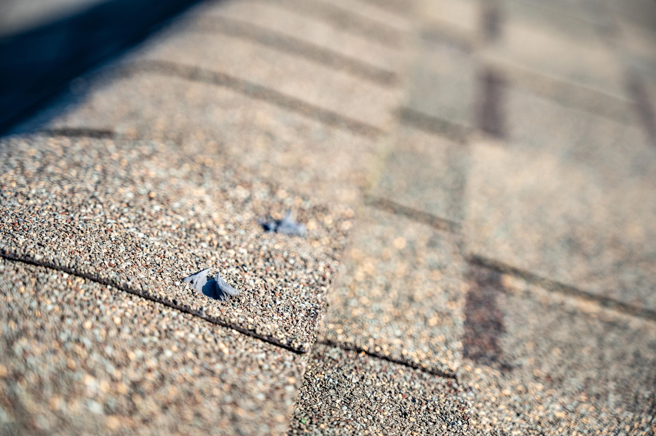 where to nail shingles-close up image of nails in shingles