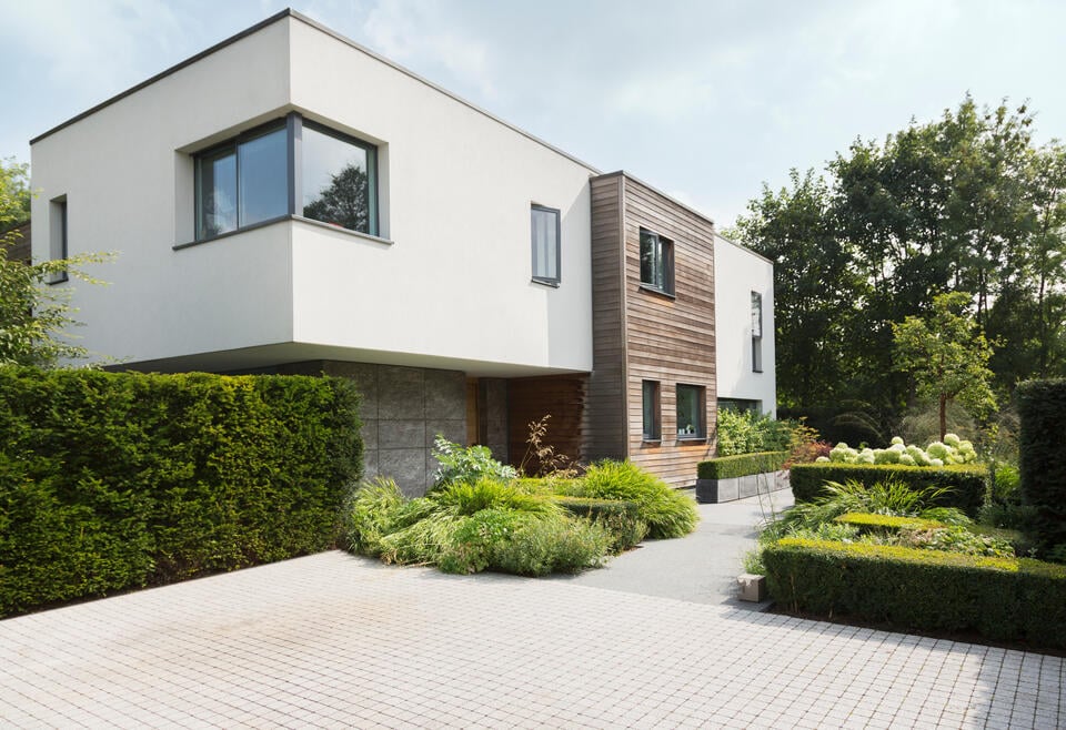 modern roof-modern home with a flat roof
