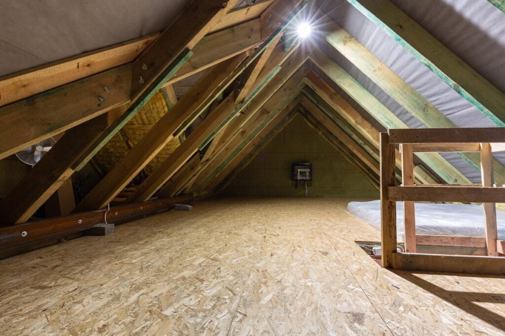 The attic of a single family house with a wooden floor attic rain